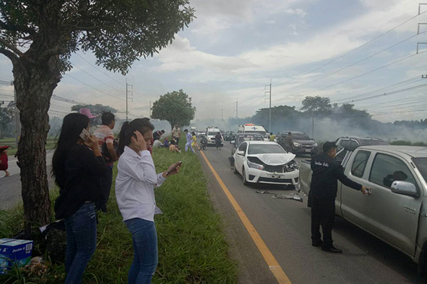 Smoke from burning grass blamed for 10-car pileup