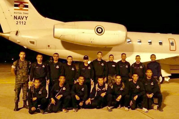 Navy special operations divers search for missing children 7km inside a flooded Tham Luang cave in Mae Sai district, Chiang Mai. (Photo posted on @ThaiSEAL Facebook account on Monday)