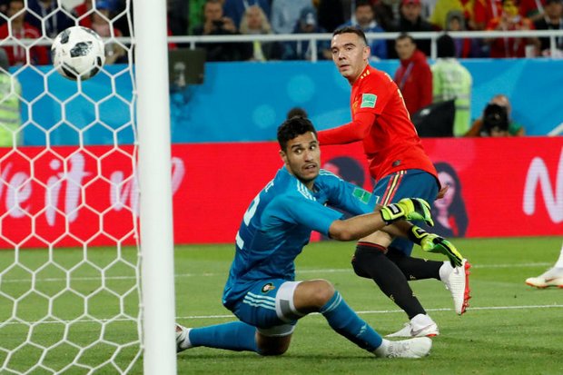 Spain, Portugal reach World Cup last-16