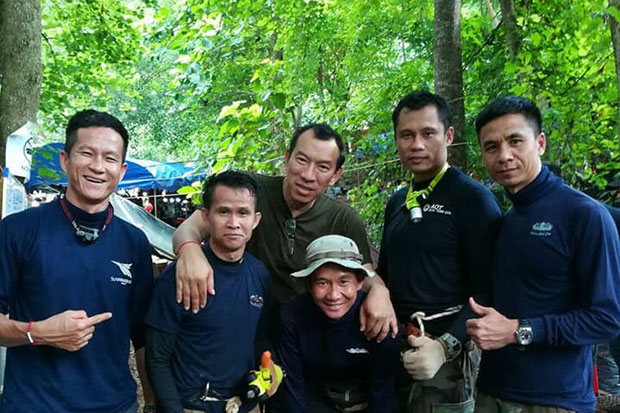 Petty Officer 1st class Saman Gunan, far left, seen in this undated photograph with what appear to be former or present Seals.