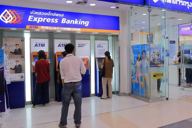 Banks have waived most fees for most transfers of funds performed digitally - and have taken their first-ever loss on such fees as a result. (File photo) Banks have waived most fees for most transfers of funds performed digitally - and have taken their first-ever loss on such fees as a result. (File photo)