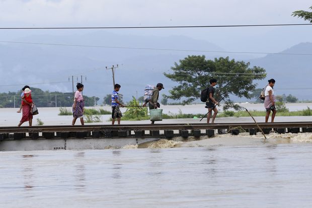 50,000 evacuate homes in Myanmar after dam breach