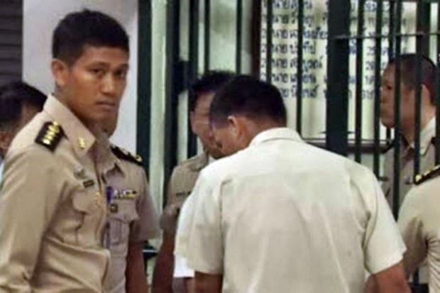 Camera-shy ex-policeman Montri was sentenced to five years at this Appeal Court hearing in July, 2015, for his role in the murder of a teenager during Thaksin's war on drugs in 2004. (Screen cap via ThaiPBS) Camera-shy ex-policeman Montri was sentenced to five years at this Appeal Court hearing in July, 2015, for his role in the murder of a teenager during Thaksin's war on drugs in 2004. (Screen cap via ThaiPBS)