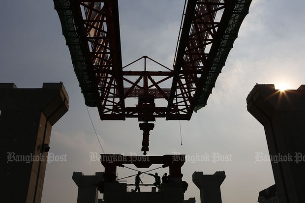 Migrant labourers work at a construction site near Bang Sue station in January this year. (Pattarapong Chatpattarasill)