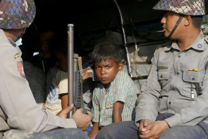 Myanmar police shoot, injure 4 in raid on Rohingya camp