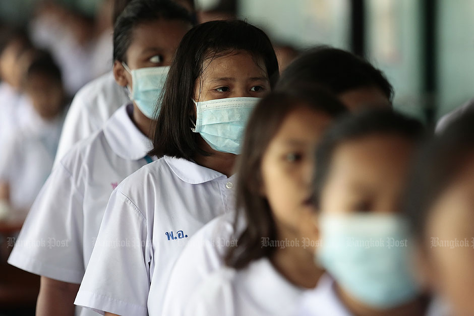Students wear face masks at Pibool Uppatham School in Huai Khwang district, Bangkok. — Patipat Janthong