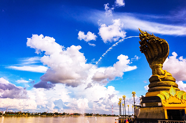 A statue of the Naga serpent with seven heads flows into the Mekong River in Nakhon Phanom province.