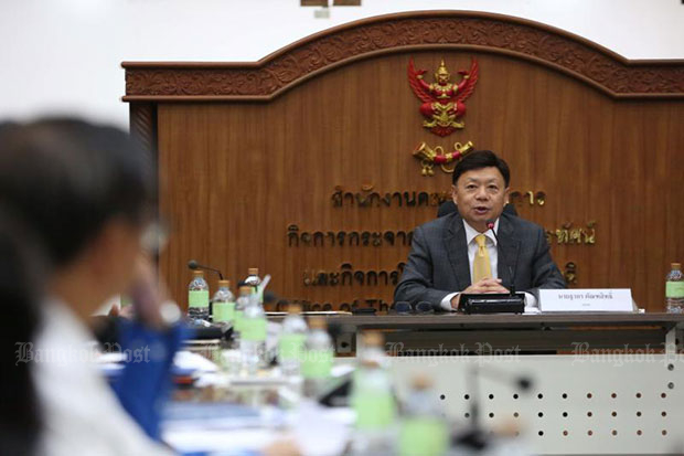 Takorn Tantasith, secretary-general of the National Broadcasting and Telecommunications Commission (NBTC), holds a meeting with mobile phone operators in 
January. (File photo)