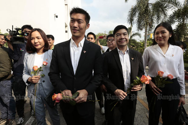 Future Forward Party leader Thanathorn Juangroongruangkit, blackjacket left, and  party executives at the Office of the Attorney-General in Bangkok on Wednesday, when police asked state prosecutors to indict them for computer crime. (Photo by Patipat Janthong)