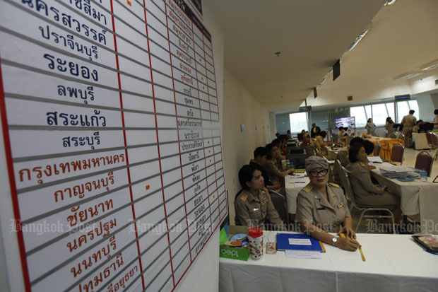 Officials of the Election Commission at the vote count room at the EC office in Bangkok on Monday (photo by Varuth Hirunyatheb)