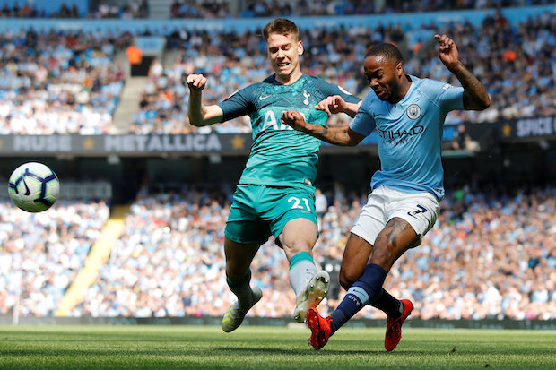 City edge Spurs to go top