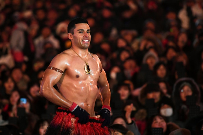 Bangkok Post - Topless Tongan eyes unique Olympic treble