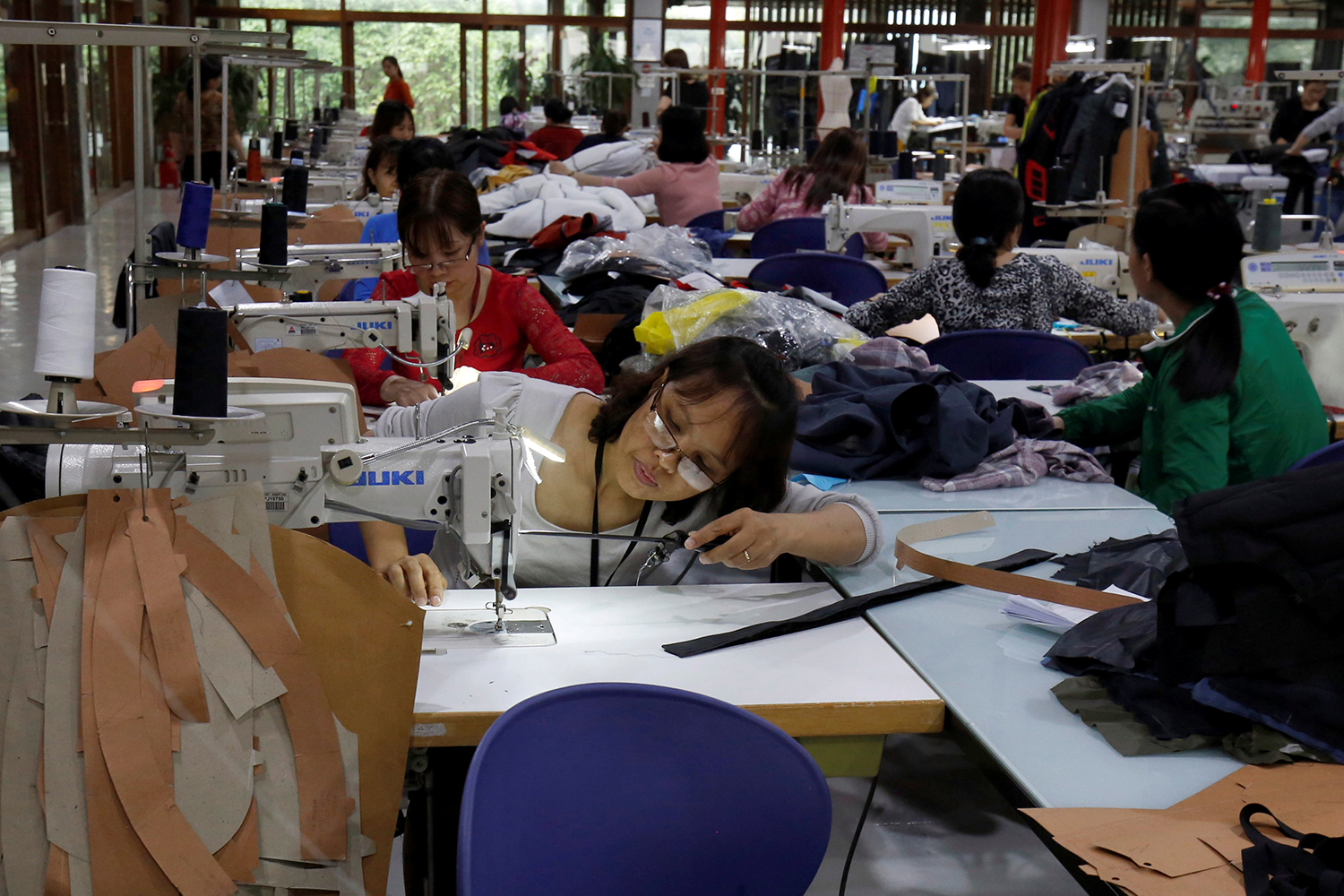 Labourers work at export garment Maxport factory in Hanoi on March 20, 2019. (Reuters photo)