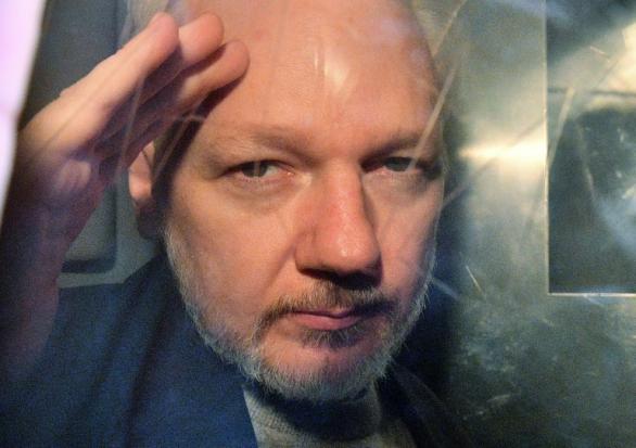 Assange to remain in Britain as Swedish court rejects extradition request