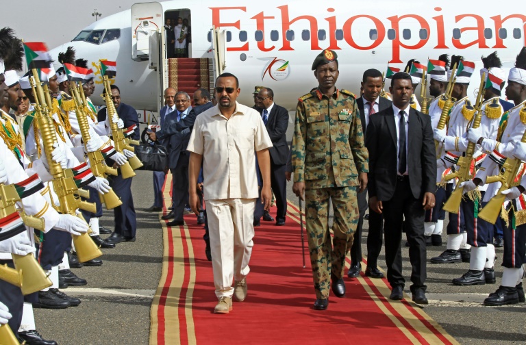 Ethiopian Prime Minister Abiy Ahmed's mission to revive talks between Sudan's military rulers and protest leaders comes days after a deadly crackdown drew international condemnation of the generals Ethiopian Prime Minister Abiy Ahmed's mission to revive talks between Sudan's military rulers and protest leaders comes days after a deadly crackdown drew international condemnation of the generals