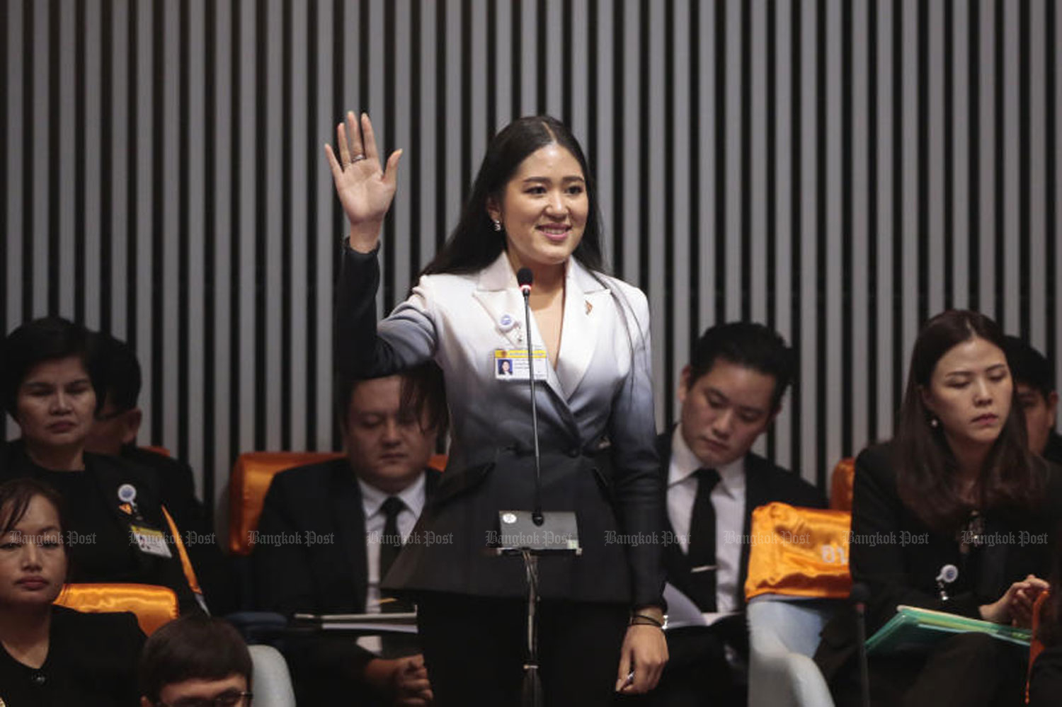 Future Forward Party MP Pannika Wanich raises her hand to speak at a parliamentary session in Bangkok last Wednesday. (Photo by Patipat Janthong)
