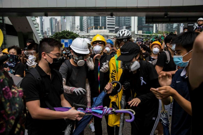 Protesters leave key roads after historic Hong Kong rally