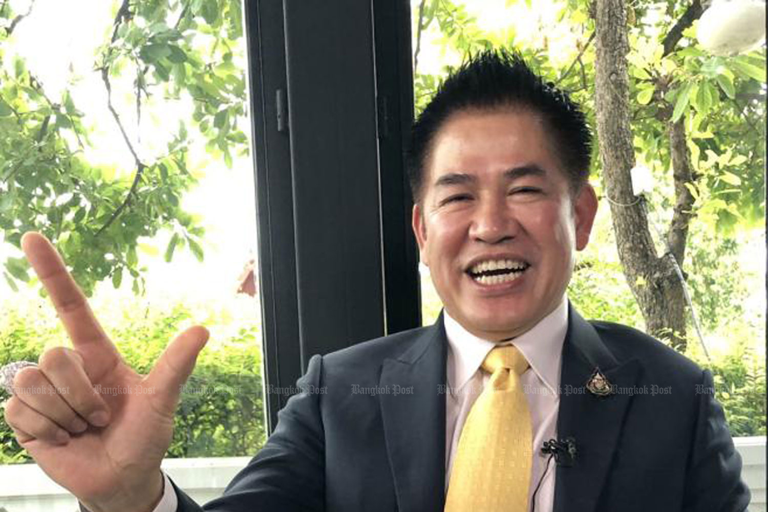 PPRP MP for Phayao, Thammanat Prompao — who is said to be the party executives' most trusted MP — gestures during an interview with the 'Bangkok Post'. (Photo by Wassana Nanuam)