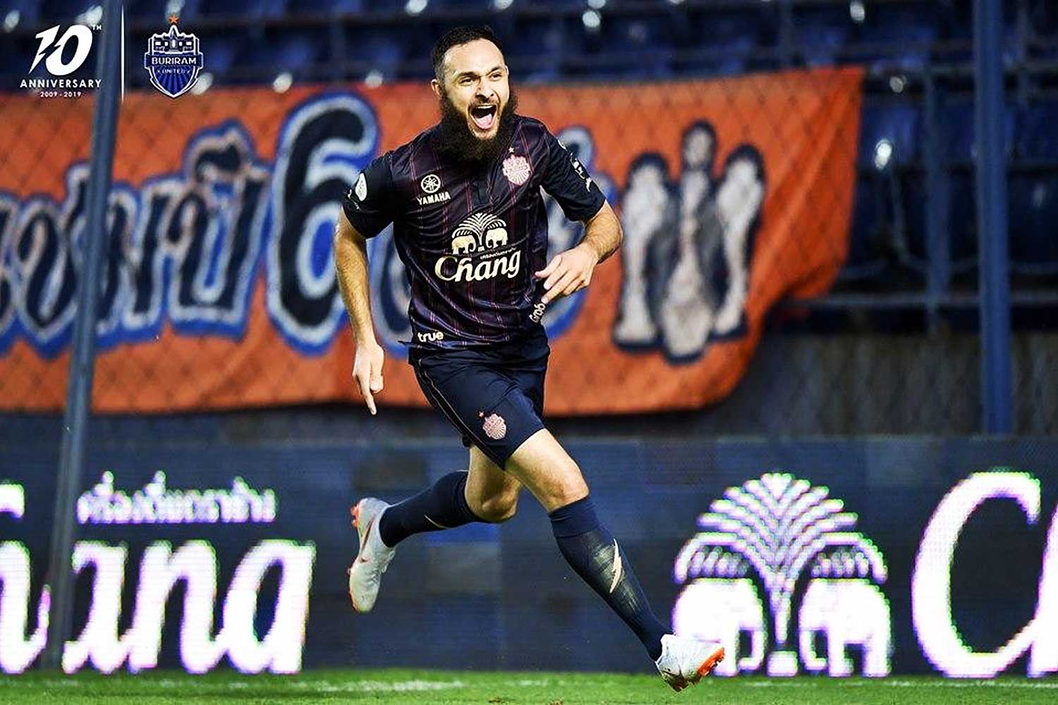 Buriram United striker Nacer Barazite celebrates his goal against Bangkok United.