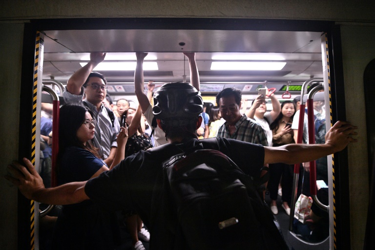 Hong Kong 'on brink' as protesters unleash travel chaos