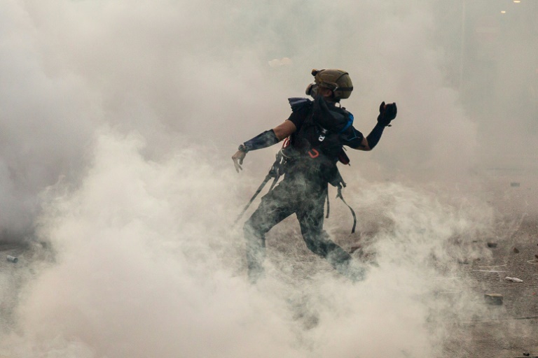 Police have ramped up their use of tear gas as two months of rallies in the global financial hub have turned increasingly violent. Police have ramped up their use of tear gas as two months of rallies in the global financial hub have turned increasingly violent.