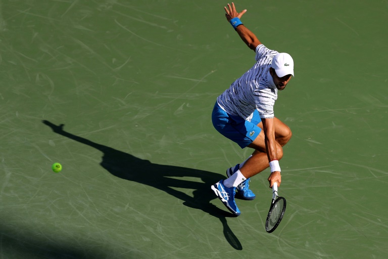 World number one Novak Djokovic of Serbia opens his Cincinnati Masters title defence with a straight-sets win over American Sam Querrey. World number one Novak Djokovic of Serbia opens his Cincinnati Masters title defence with a straight-sets win over American Sam Querrey.
