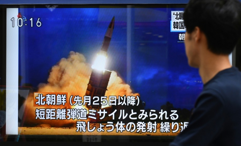 A pedestrian in Tokyo watches a television report on the latest North Korean launch. (AFP photo) A pedestrian in Tokyo watches a television report on the latest North Korean launch. (AFP photo)