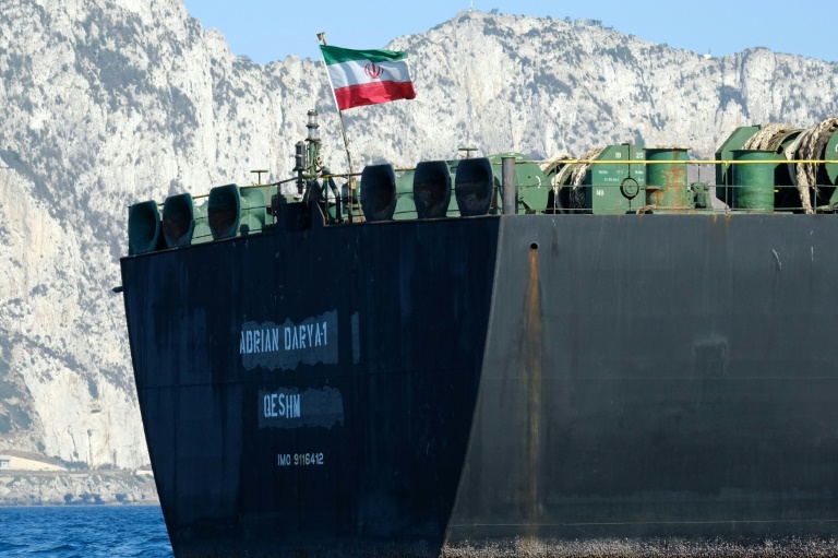 An Iranian flag flutters on board the Adrian Darya oil tanker, formerly known as Grace 1, off the coast of Gibraltar on August 18, before it set sail. An Iranian flag flutters on board the Adrian Darya oil tanker, formerly known as Grace 1, off the coast of Gibraltar on August 18, before it set sail.