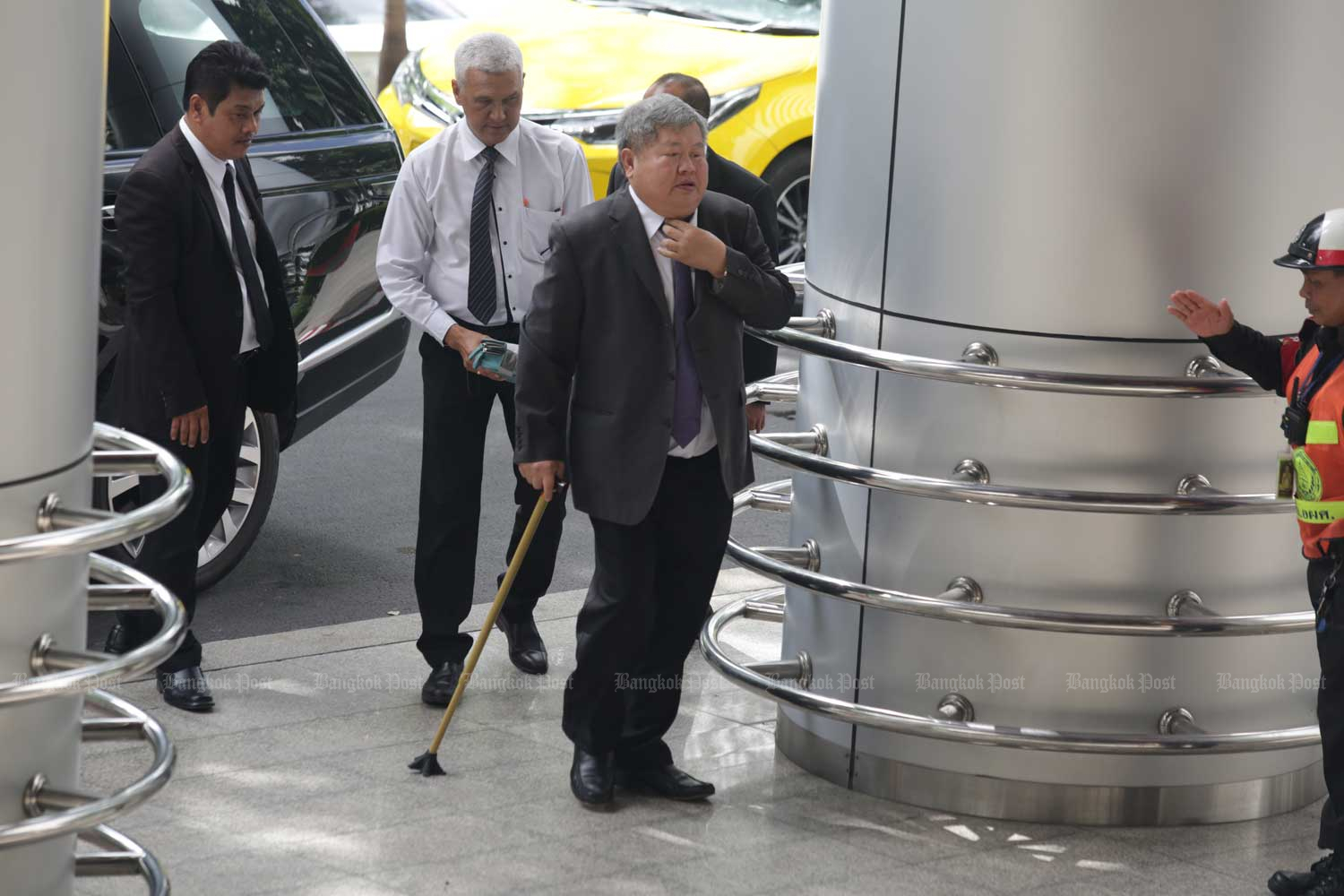 Premchai Karnasuta arrives at the Criminal Court in Bangkok on Tuesday. (Photo by Apichit Jinakul)