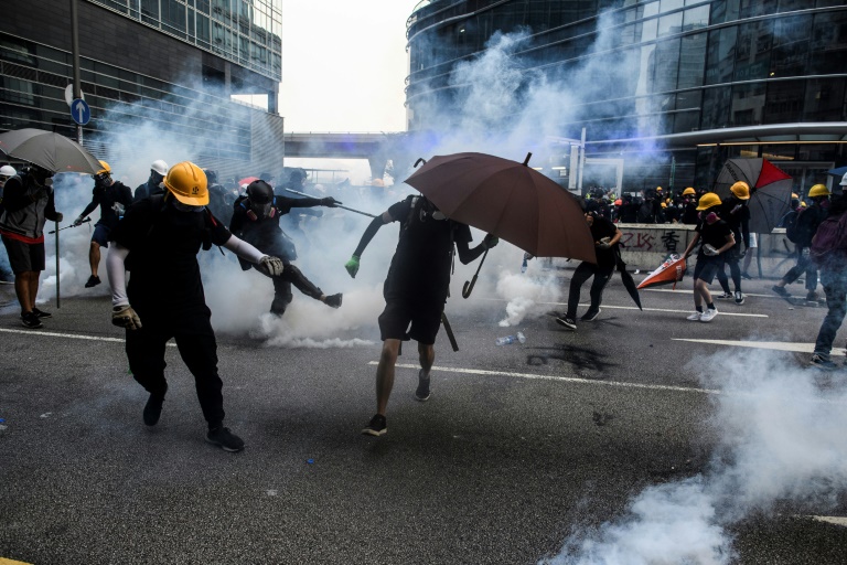 Saturday's clashes saw police baton-charge protesters and fire tear gas. Saturday's clashes saw police baton-charge protesters and fire tear gas.