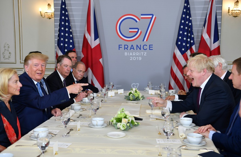 Trump backs Johnson, sends mixed signals on China at G7