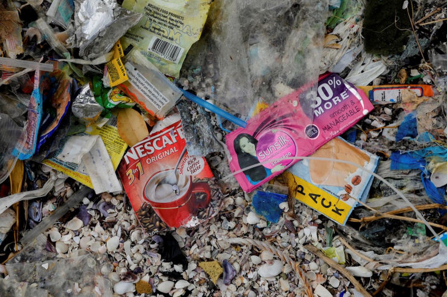 Slaves to sachets: How poverty worsens plastics pollution