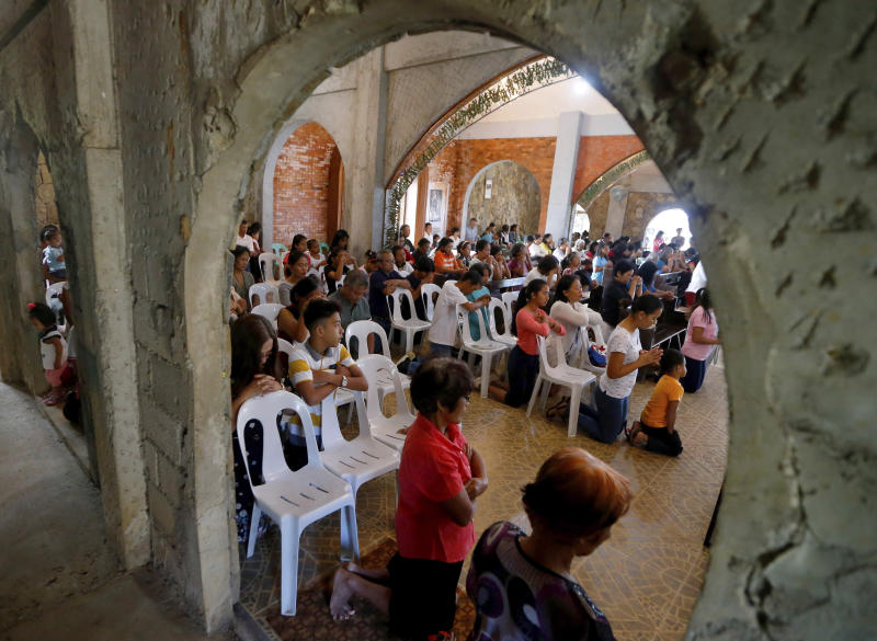 In this Jan 27, 2019 photo, worshippers attend a Sunday Mass officiated by a substitute priest in the chapel built by US priest Father Pius Hendricks in the village of Talustusan on Biliran Island in the central Philippines. (AP photos)