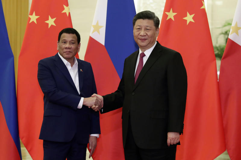 In this April 25, 2019, file photo, Philippine President Rodrigo Duterte, left, poses with Chinese President Xi Jinping for a photo before their meeting at the Great Hall of the People in Beijing. (AP photo) In this April 25, 2019, file photo, Philippine President Rodrigo Duterte, left, poses with Chinese President Xi Jinping for a photo before their meeting at the Great Hall of the People in Beijing. (AP photo)