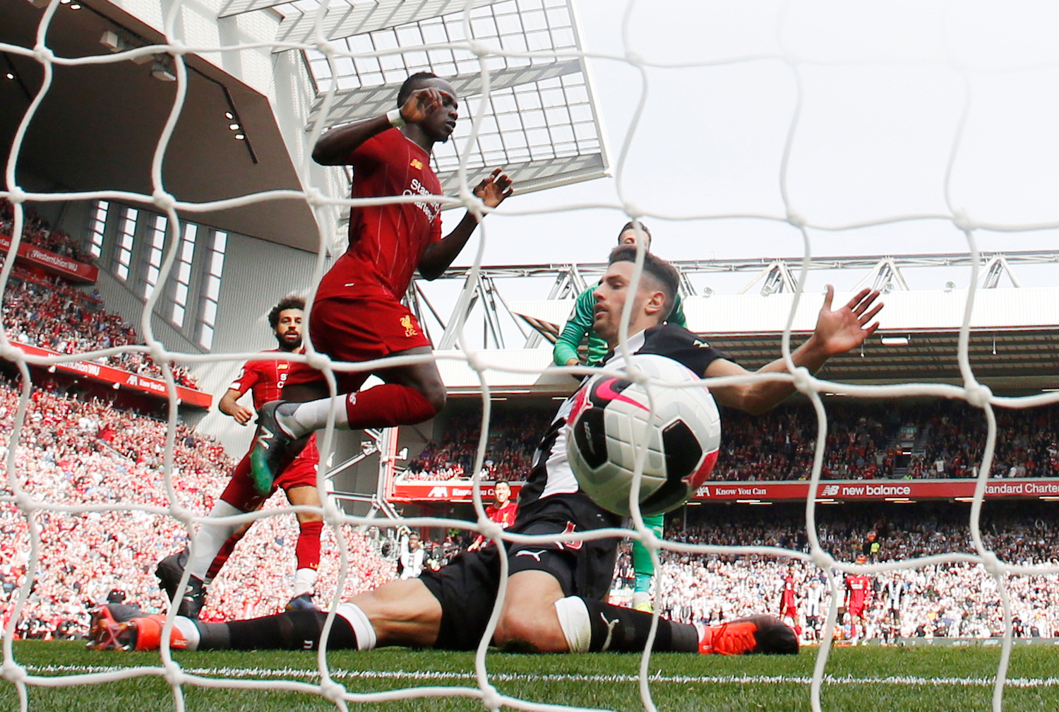 Sadio Mane scores Liverpool’s second goal during their Premier League match against Newcastle at Anfield on Saturday
