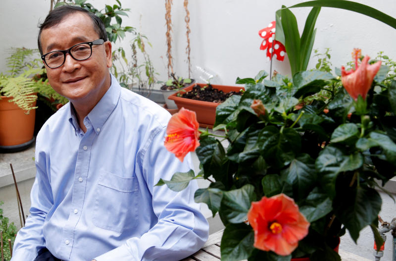 Sam Rainsy, exiled former president of the dissolved opposition Cambodia National Rescue Party, poses on his terrace in Paris, France, July 19, 2018. (Reuters file photo) Sam Rainsy, exiled former president of the dissolved opposition Cambodia National Rescue Party, poses on his terrace in Paris, France, July 19, 2018. (Reuters file photo)