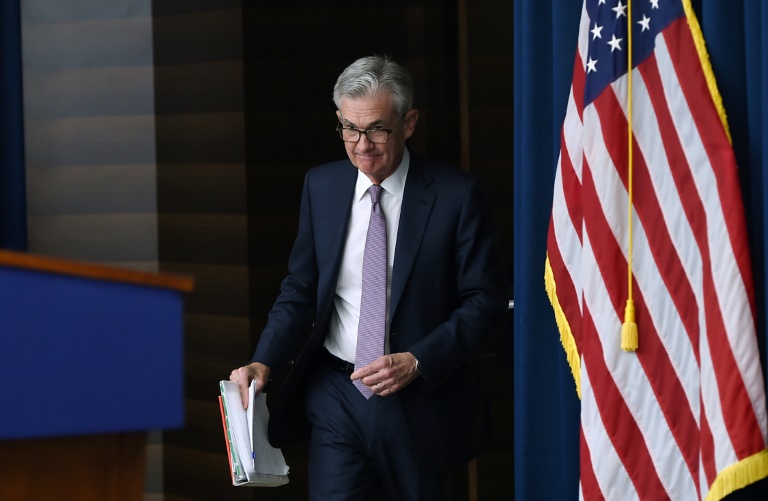 US Fed cuts key interest rate a quarter point, citing 'uncertainties'