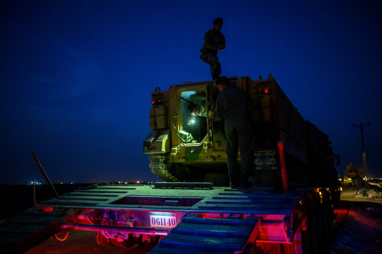 Turkish troops keep up their build-up along the Syrian border though the night as the government promises a long-threatend assault on the Kurdish-ruled northeast will begin Turkish troops keep up their build-up along the Syrian border though the night as the government promises a long-threatend assault on the Kurdish-ruled northeast will begin