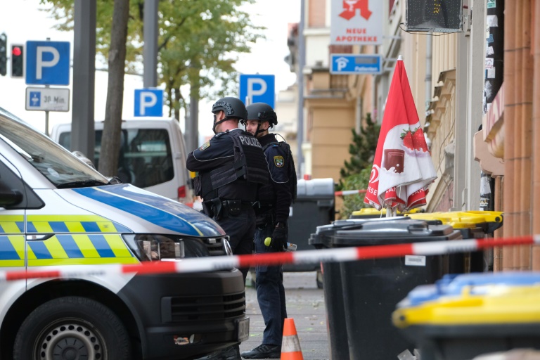 Policemen secured the area around the site of a shooting in the Germany city of Halle Policemen secured the area around the site of a shooting in the Germany city of Halle