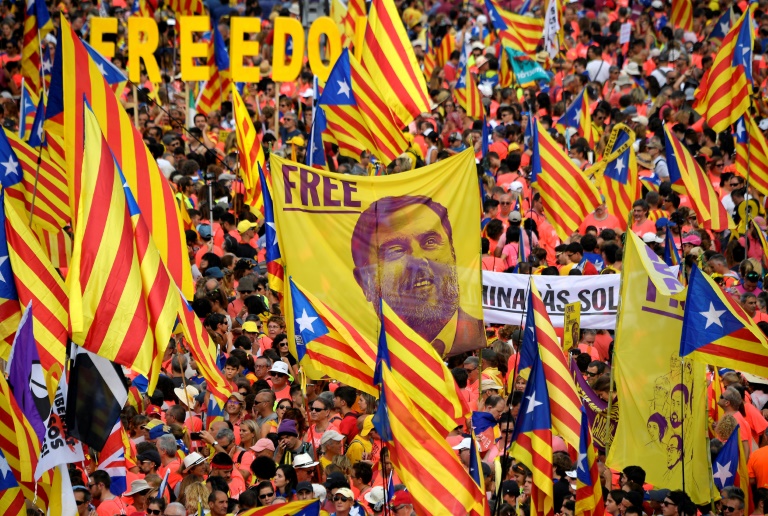 Riot police clash with protesters in Barcelona