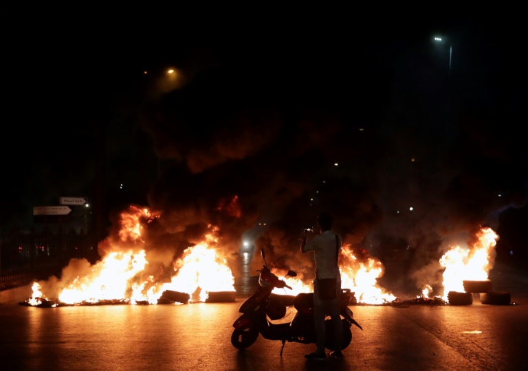 Protesters storm Lebanon after government proposes WhatsApp tax Protesters storm Lebanon after government proposes WhatsApp tax