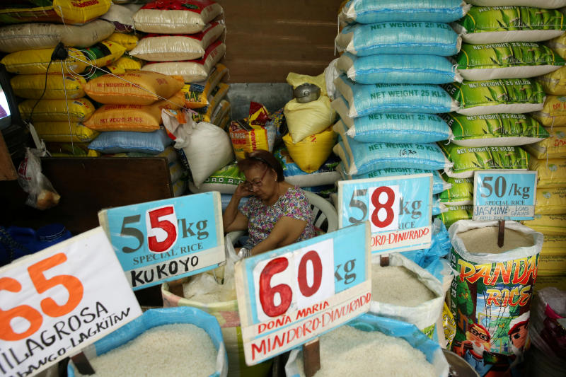 A vendor rests in her market stand that sells rice in Quezon City, Metro Manila in Philippines, Sept 5, 2018. (Reuters file photo) A vendor rests in her market stand that sells rice in Quezon City, Metro Manila in Philippines, Sept 5, 2018. (Reuters file photo)