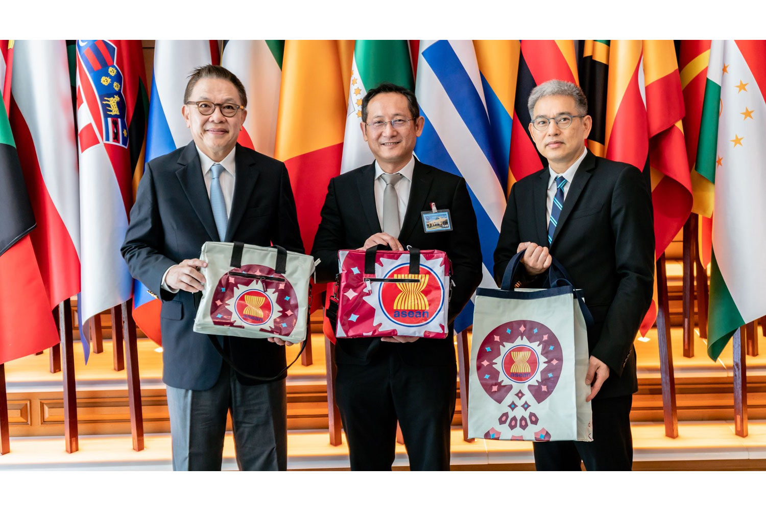 Caption: Mr. Visit Malaisirirat, CEO of Magnolia Quality Development Corporation Limited (MQDC) (center) presented upcycled bags to Mr. Tharit Charoongwat (left), Former Ambassador and Head of ASEAN Summit Operation 2019 in the Ministry of Foreign Affairs, and Mr. Jittapat Thongprasert (right), Ambassador Attached to the Ministry Office of the Permanent Secretary at the Ministry of Foreign Affairs. The bags will be presented to the heads of each national delegation at the ASEAN Summit and their partners. Caption: Mr. Visit Malaisirirat, CEO of Magnolia Quality Development Corporation Limited (MQDC) (center) presented upcycled bags to Mr. Tharit Charoongwat (left), Former Ambassador and Head of ASEAN Summit Operation 2019 in the Ministry of Foreign Affairs, and Mr. Jittapat Thongprasert (right), Ambassador Attached to the Ministry Office of the Permanent Secretary at the Ministry of Foreign Affairs. The bags will be presented to the heads of each national delegation at the ASEAN Summit and their partners.