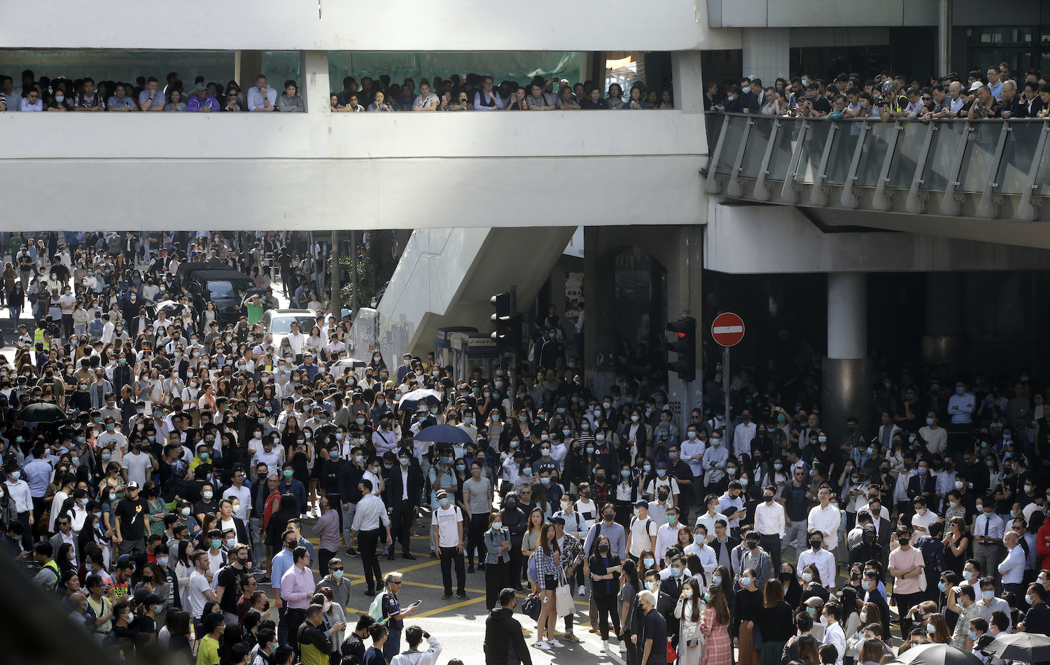Protesters gather for a demonstration in the financial district in Hong Kong on Friday. (AP Photo) Protesters gather for a demonstration in the financial district in Hong Kong on Friday. (AP Photo)