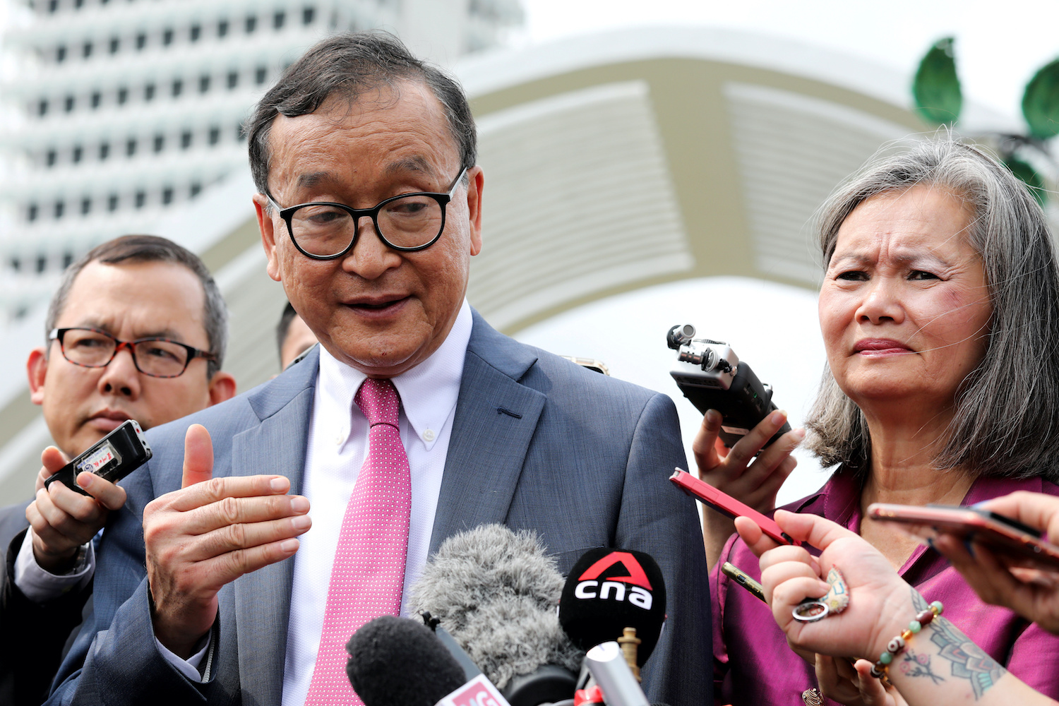 Sam Rainsy and Mu Sochua, deputy president of the Cambodia National Rescue Party (CNRP), speak to reporters in Kuala Lumpur on Wednesday. (Reuters Photo)