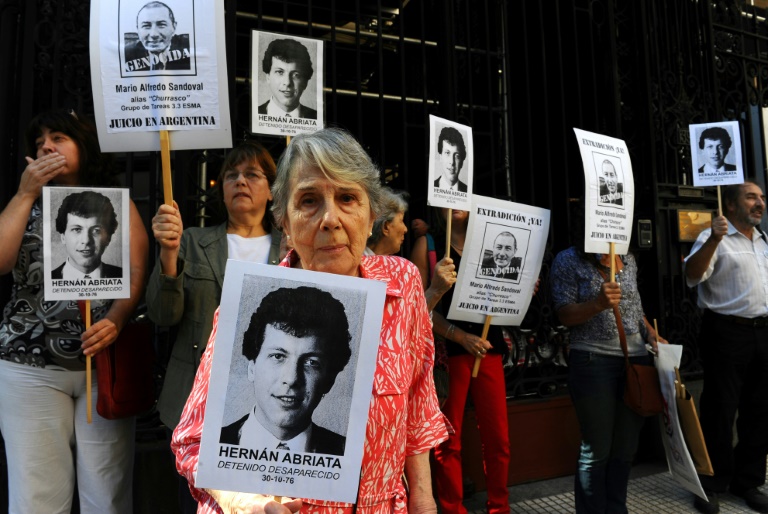 Abriata's 92-year-old mother Beatriz Cantarini de Abriata, shown here at a protest in 2014, is Abriata's 92-year-old mother Beatriz Cantarini de Abriata, shown here at a protest in 2014, is