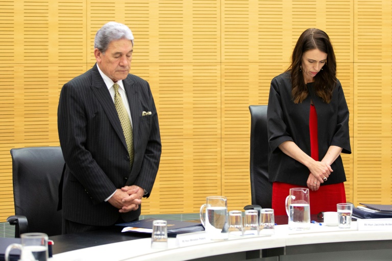 New Zealand Prime Minister Jacinda Ardern leads a minute's silence to remember the volcano victims. New Zealand Prime Minister Jacinda Ardern leads a minute's silence to remember the volcano victims.