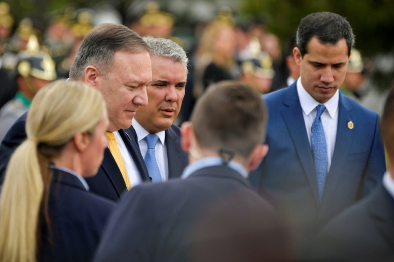 US Secretary of State Mike Pompeo (L), Colombian President Ivan Duque (C) and Venezuelan opposition leader Juan Guaido walk together in Bogota at a regional summit on terrorism US Secretary of State Mike Pompeo (L), Colombian President Ivan Duque (C) and Venezuelan opposition leader Juan Guaido walk together in Bogota at a regional summit on terrorism