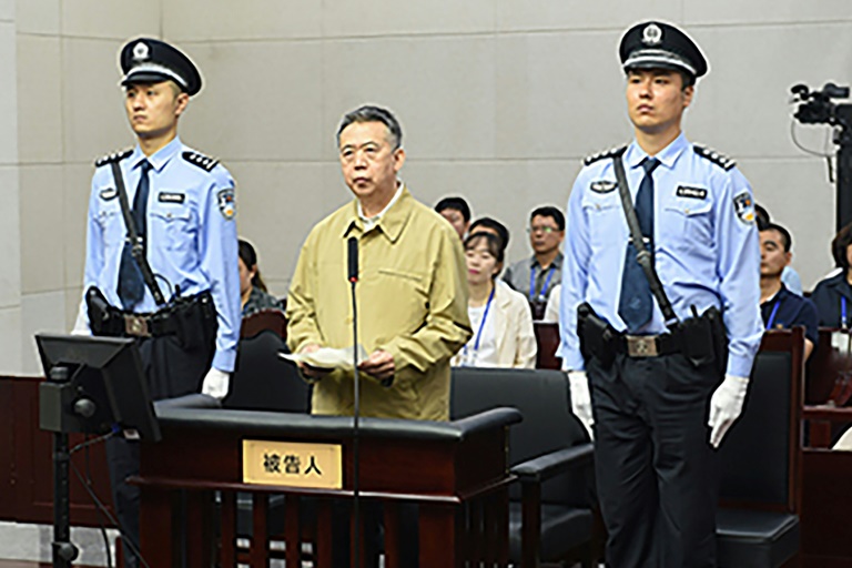 China's former Interpol chief jailed for 13 years