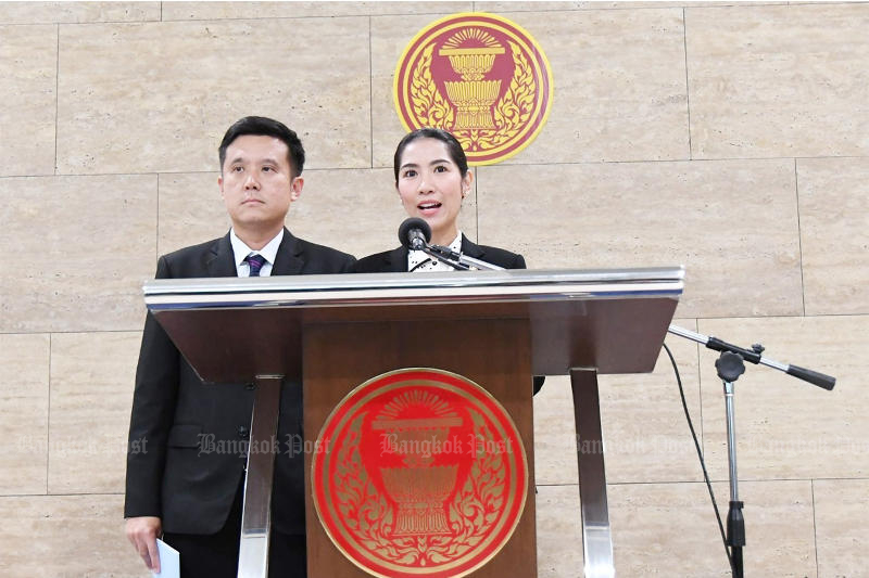 Prim Pooncharoen of the Palang Pracharath Party speaks as her party colleague, Chaiwut Thanakhamanusorn, looks on in a press conference in Parliament on Thursday defending the former's vote more than once during the budget debate session. Prim Pooncharoen of the Palang Pracharath Party speaks as her party colleague, Chaiwut Thanakhamanusorn, looks on in a press conference in Parliament on Thursday defending the former's vote more than once during the budget debate session.